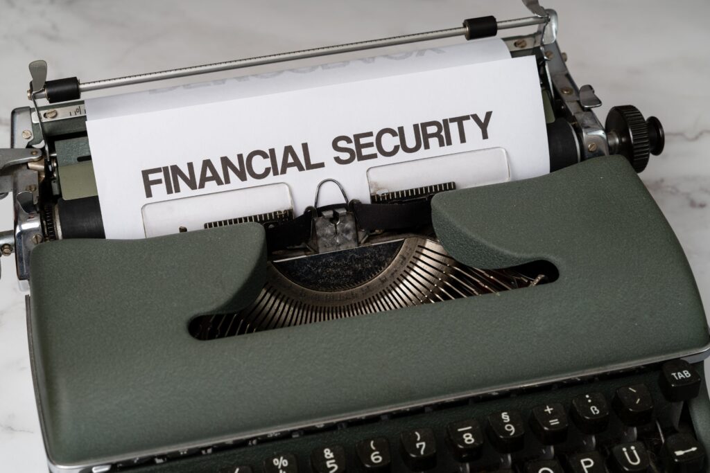 Typewriter displaying 'financial security' - symbolising liability coverage and protection.